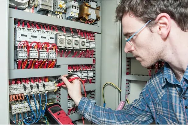 An electrician conducting a test to show how it can protect employees.